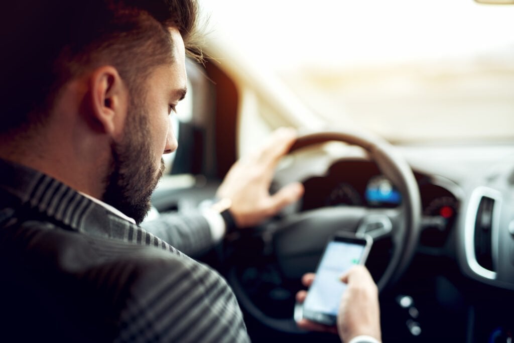 UK mobile phone driving laws: What they mean for PCO drivers