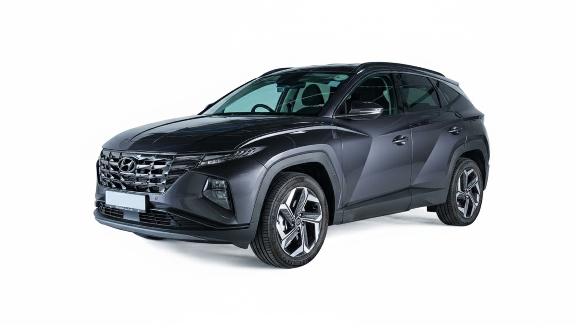 Hyundai Tucson PHEV diagonal Dark Knight copy.jpg