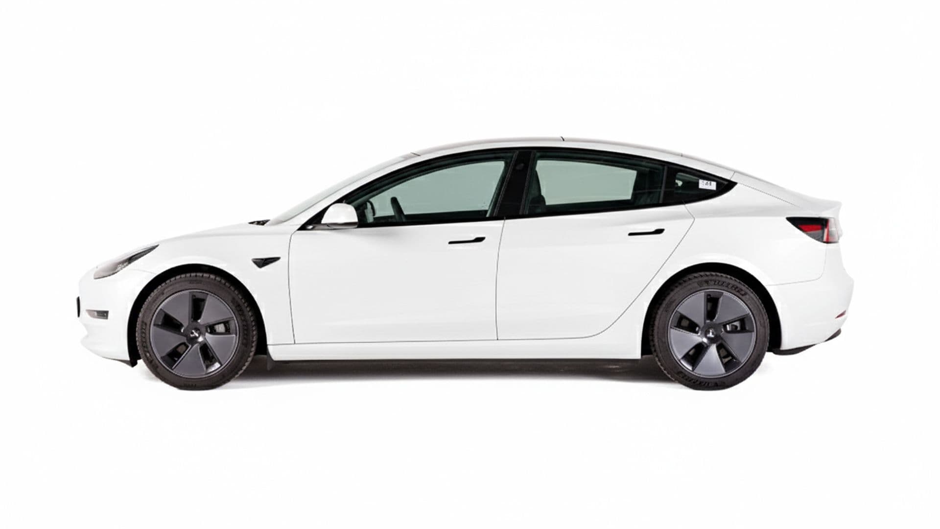 MODEL 3 STANDARD RANGE + - Tesla Model 3 white side copy.jpg